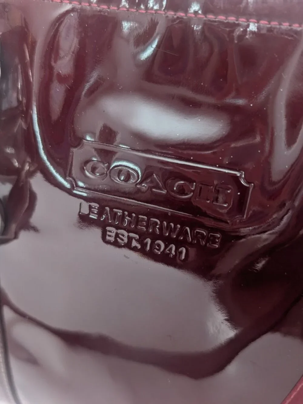 Coach Plum/Burgundy patent leather handbag